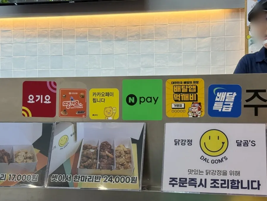 Wide shot of Dalgom's open kitchen cooking area
