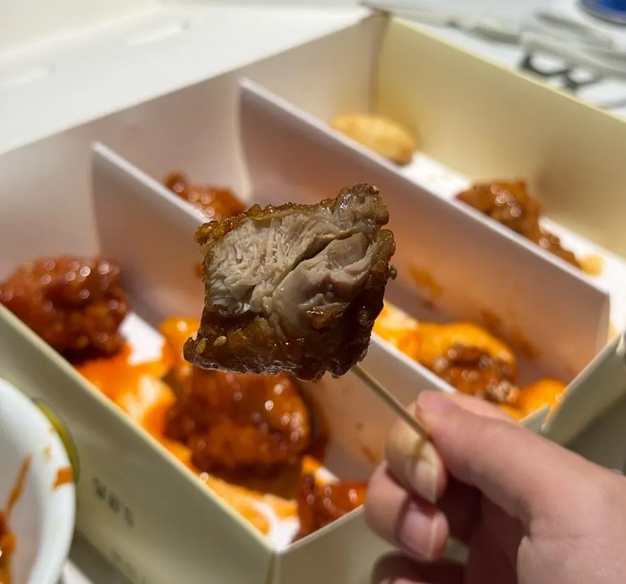 Dakgangjeong eaten at home with complimentary pickled radish