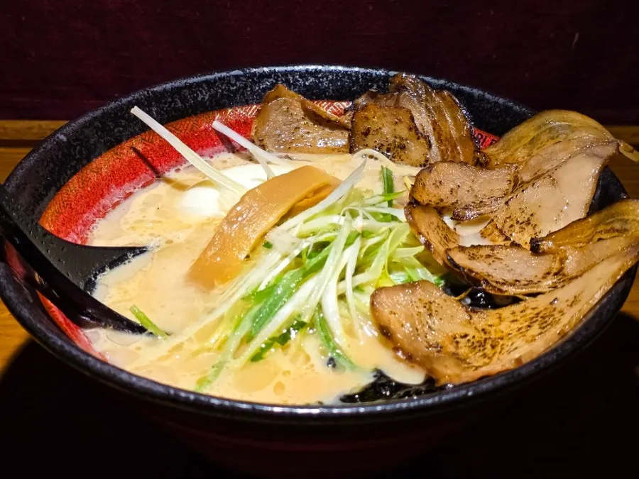 Finishing a meal of mazemen and Aori Ramen