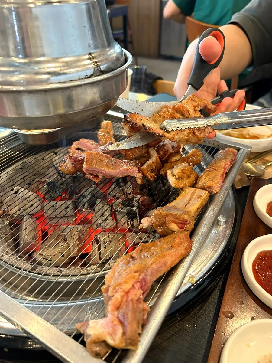 Thick marinated pork galbi on the charcoal grill