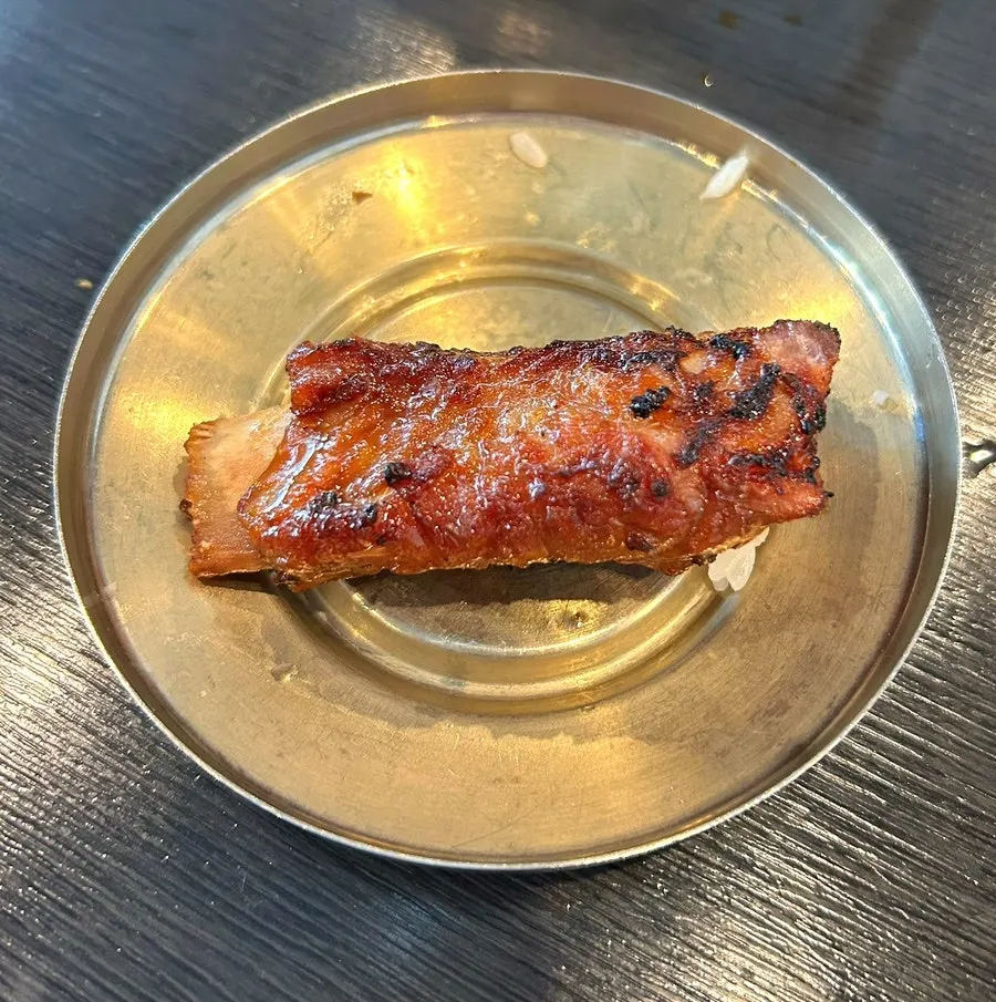 Pork galbi grilled to the very last piece over charcoal