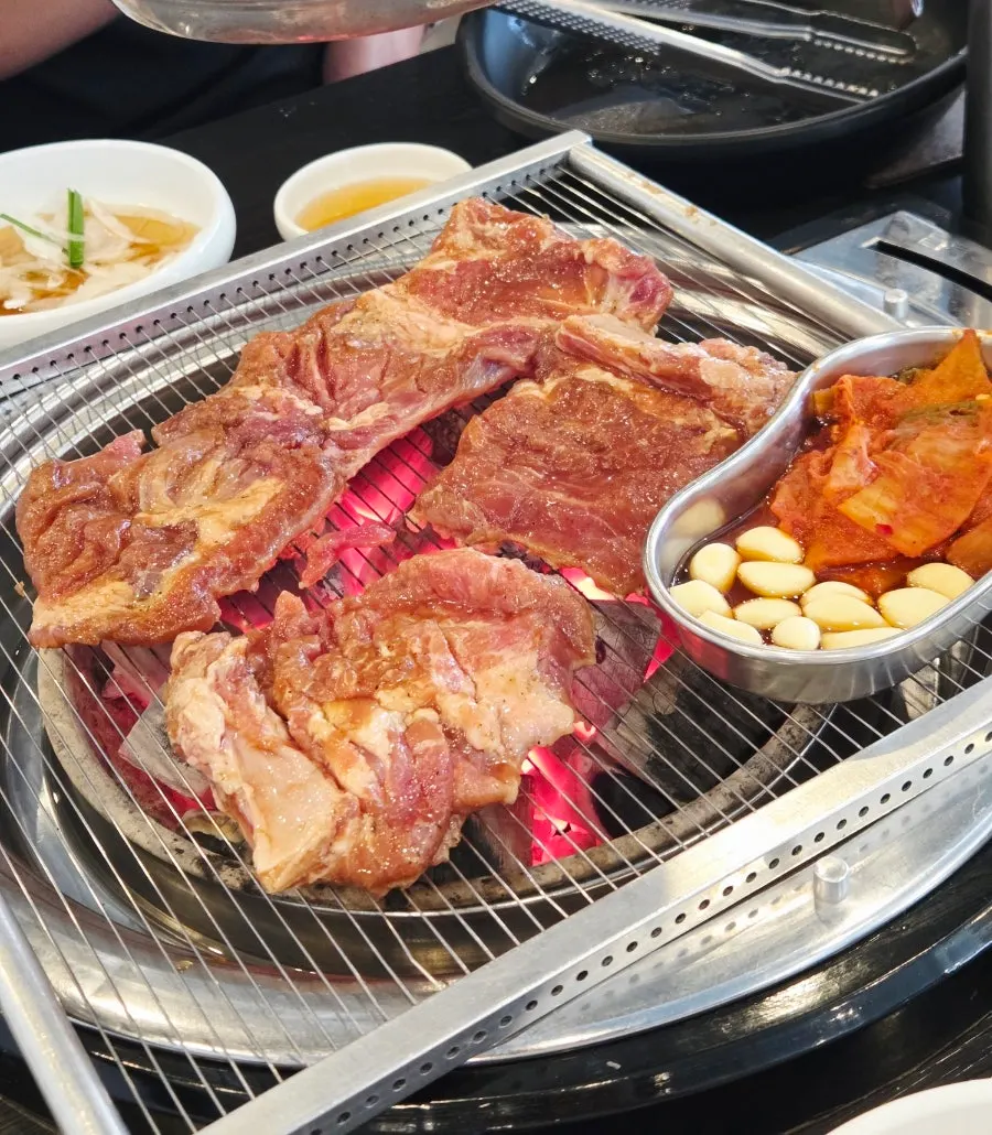 Handmade marinated galbi on the charcoal grill