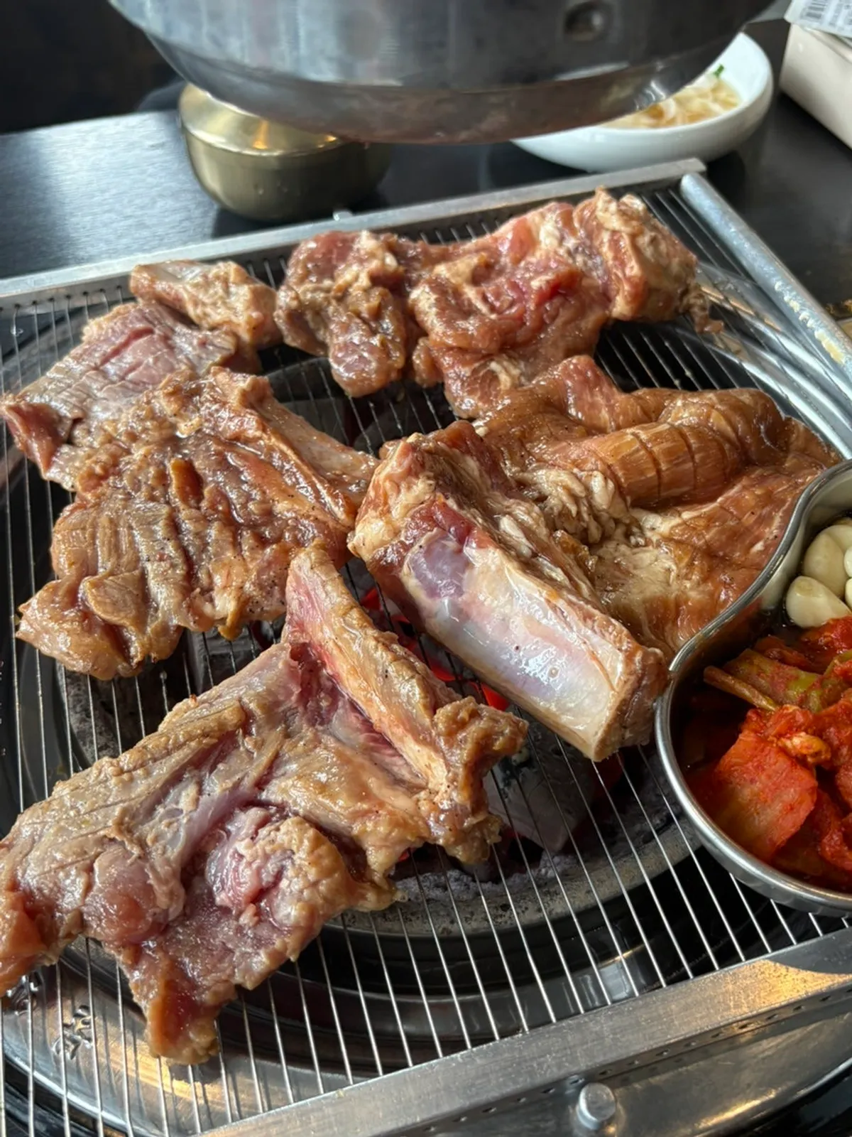 Marinated galbi grilling over charcoal at Uijeongbu Manpo Galbi