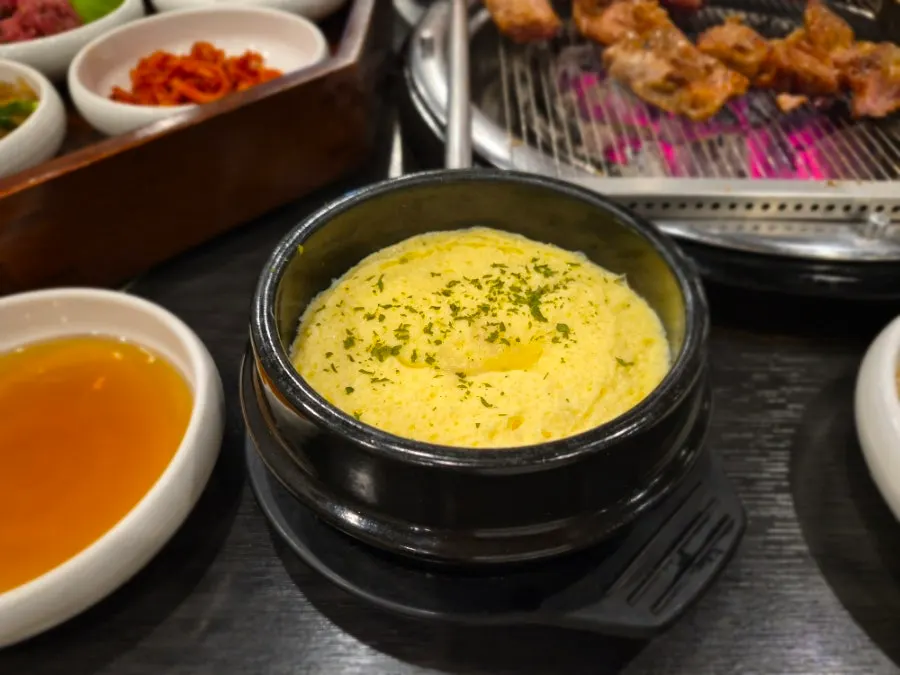 Marinated pork galbi cooking over charcoal