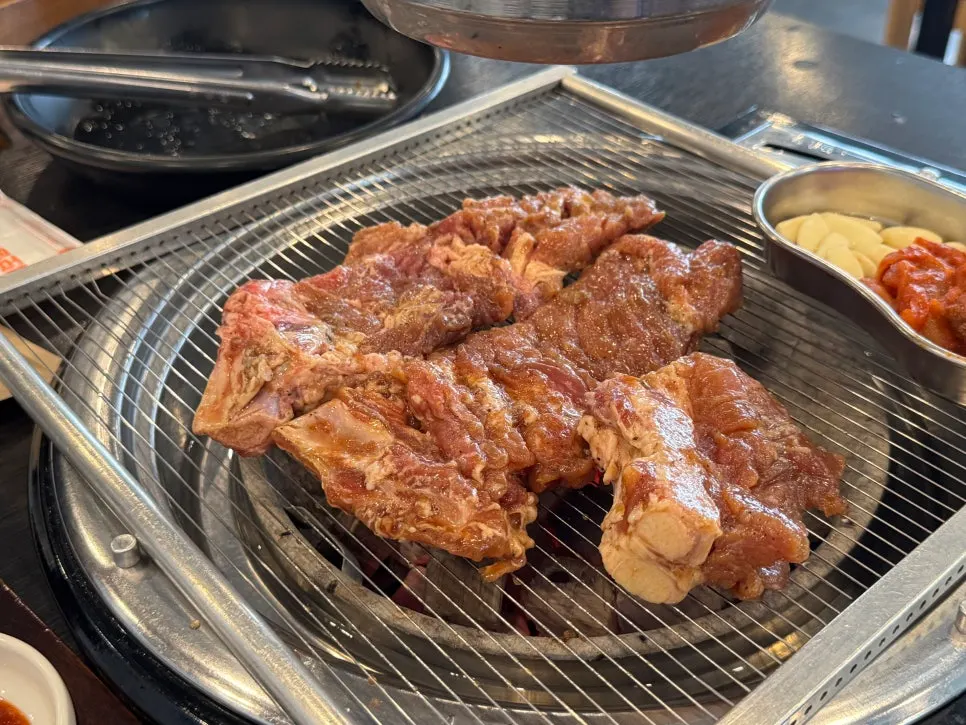 Manpo Galbi's handmade marinated galbi cooked golden brown