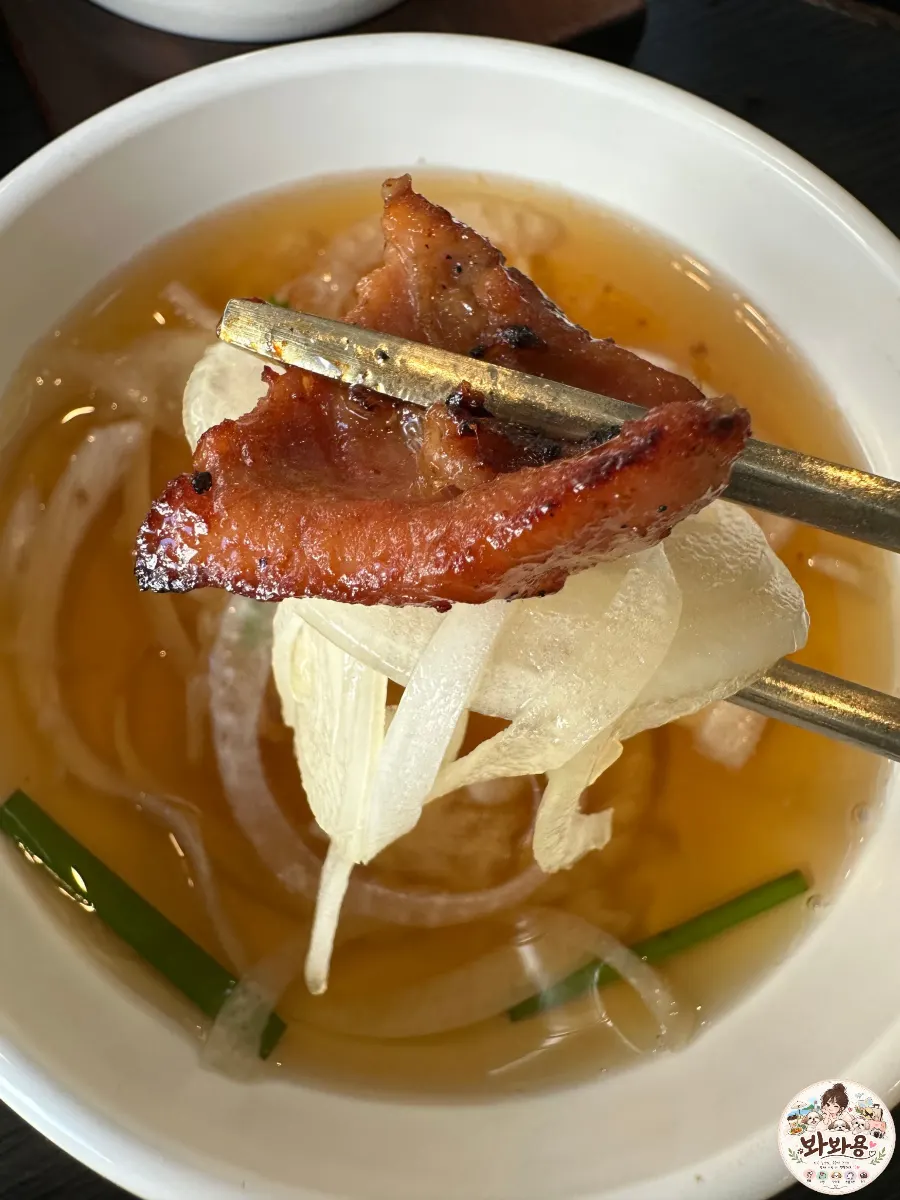 Close-up of a grilled piece of marinated galbi