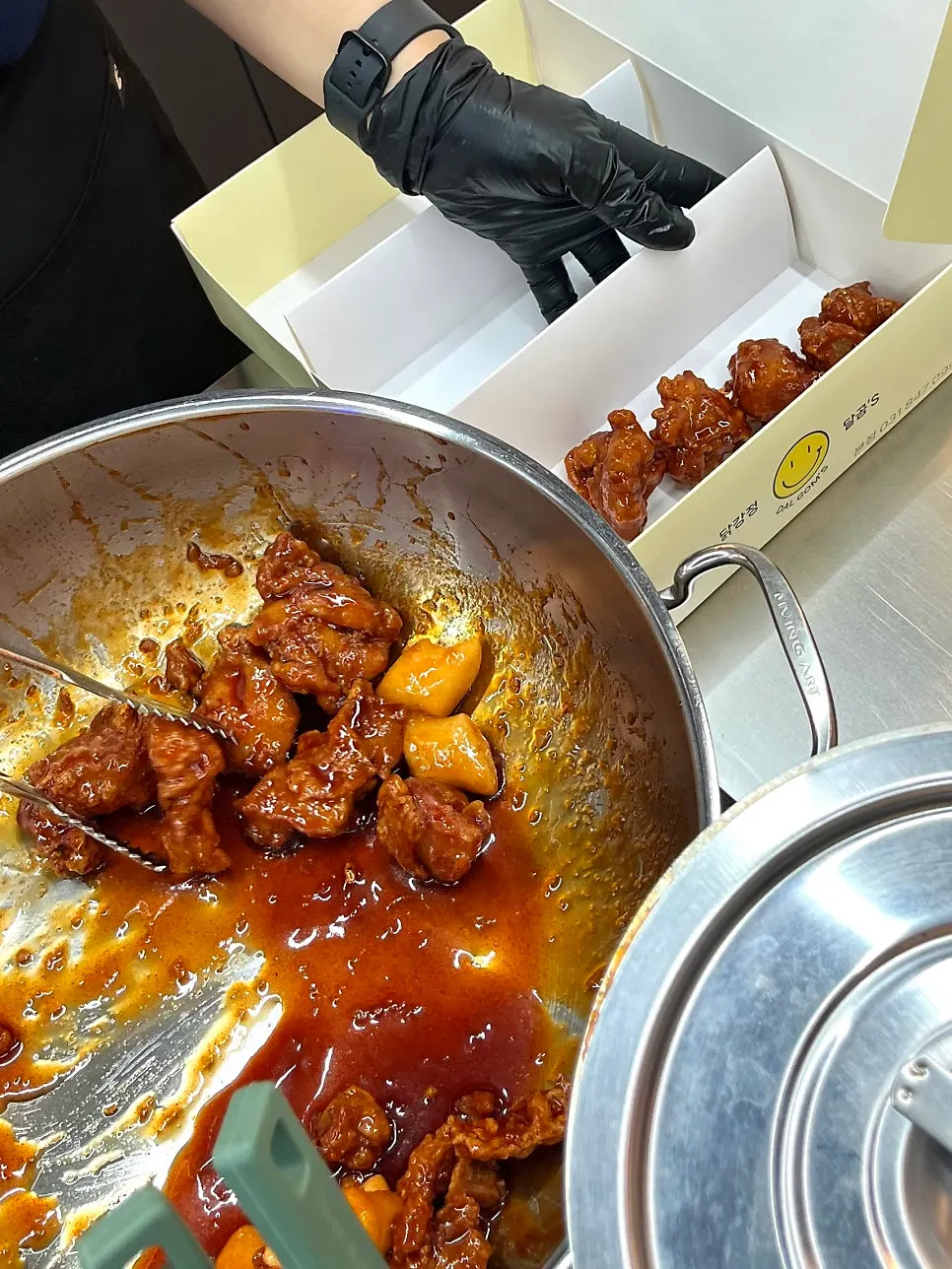 Dakgangjeong tossed with a generous coating of popberokle powder