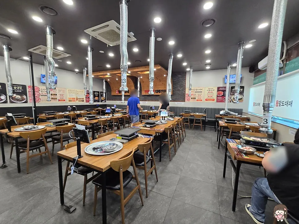 Neatly arranged seats and tables at the BBQ restaurant