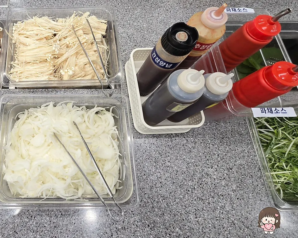 Lettuce wraps and sauces corner at the self-serve bar