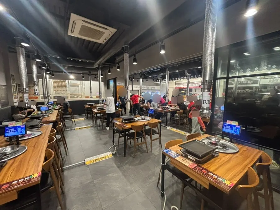 Spacious dining hall with many tables