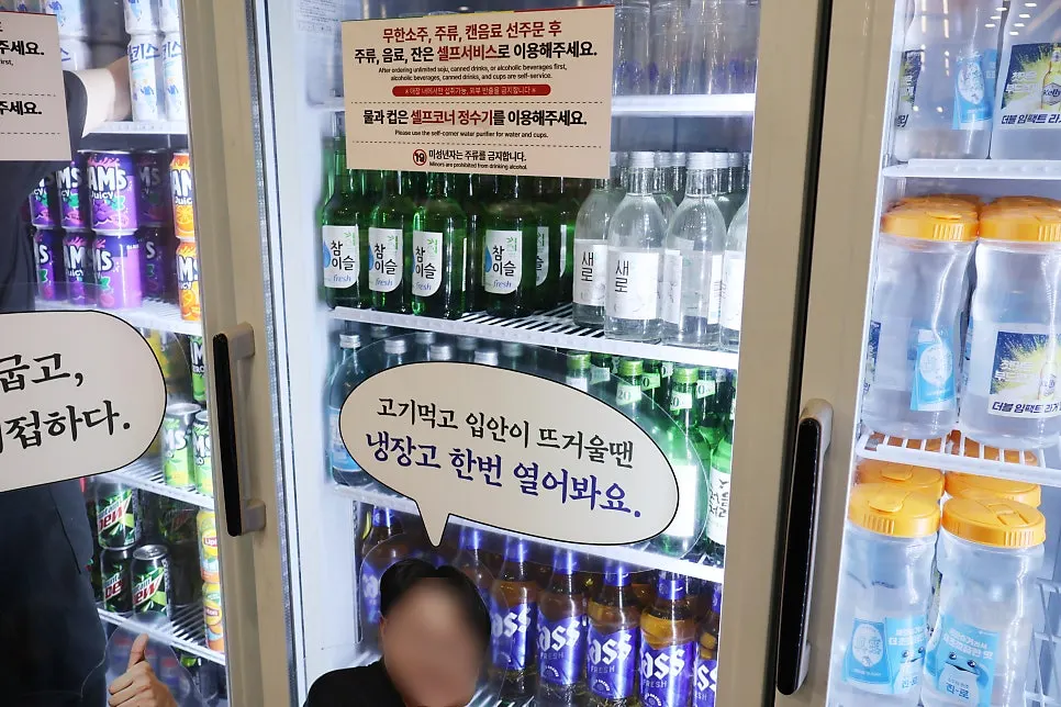 Sign showing all-you-can-eat pricing and kids' rates