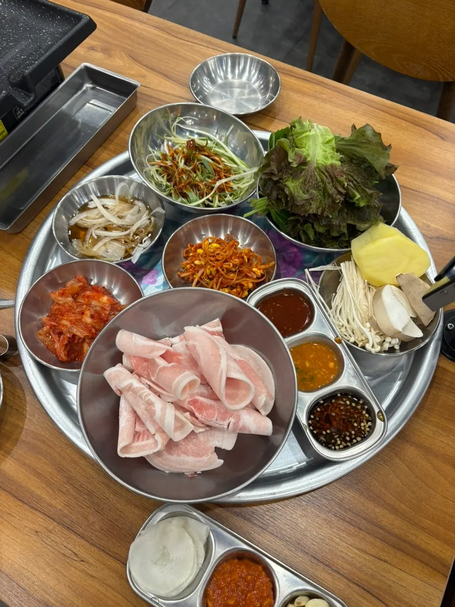 Table set up with meat and sauces
