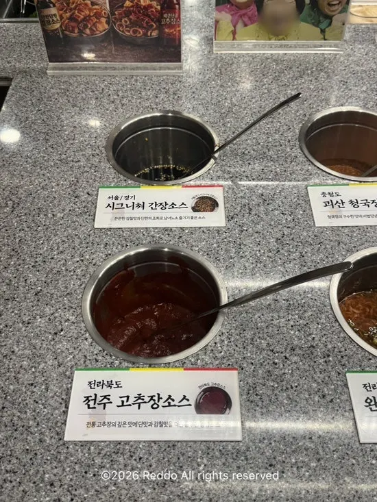 Side dish corner with seasoned bean sprouts and kimchi