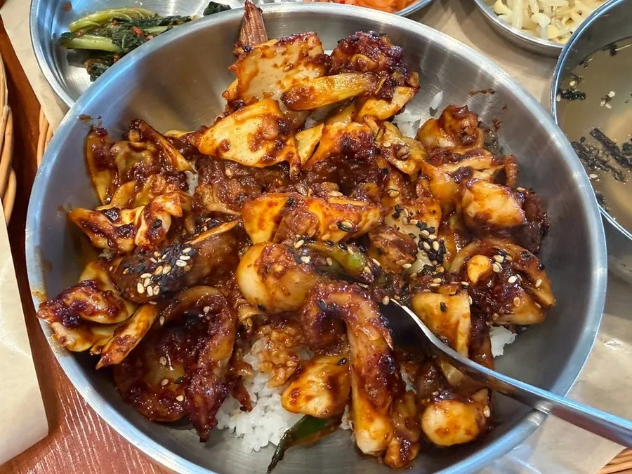 Charcoal-grilled octopus placed on top of rice