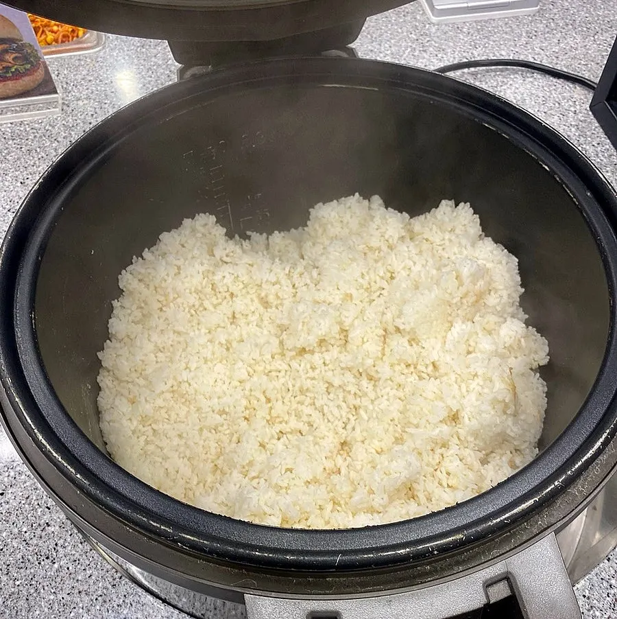 Rice, fried-rice ingredients and dinner rolls corner