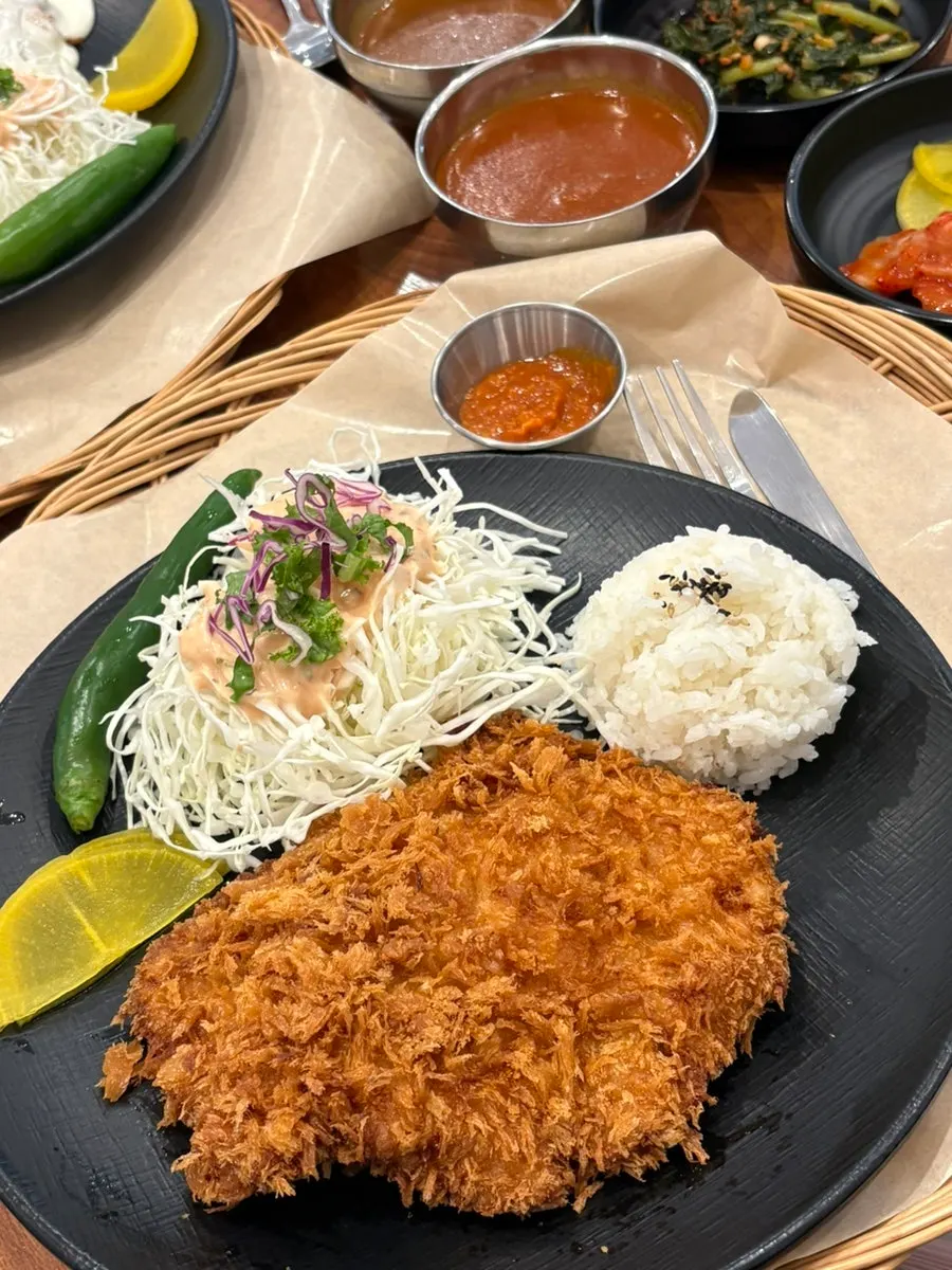 Spicy donkaseu topped with spicy sauce