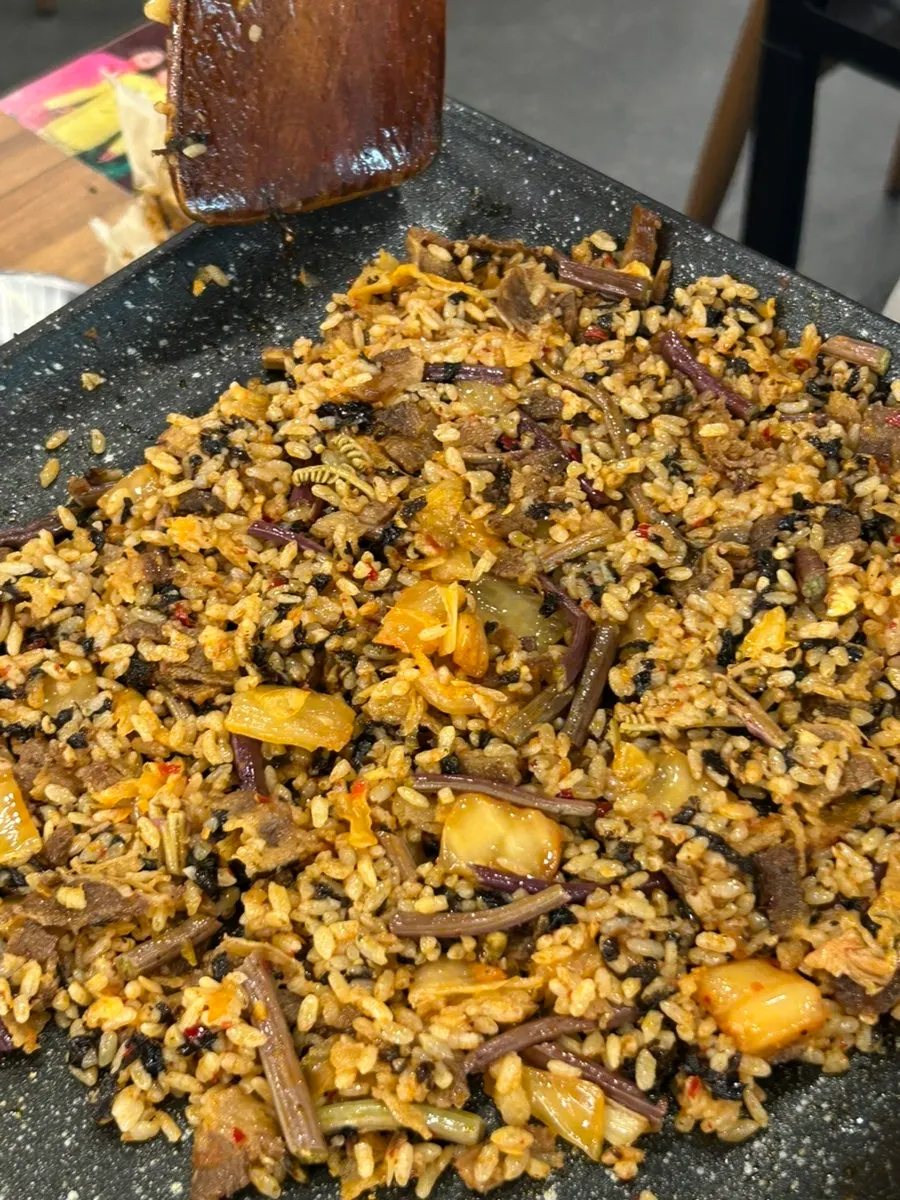 Fried rice being cooked on the grill