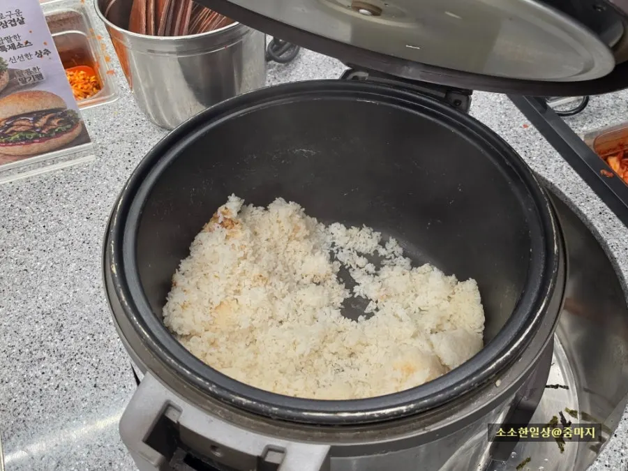 Steamed rice and breakfast rolls station