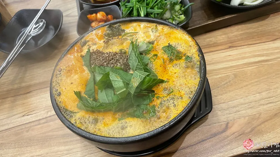 Bone soup served in a large earthenware bowl