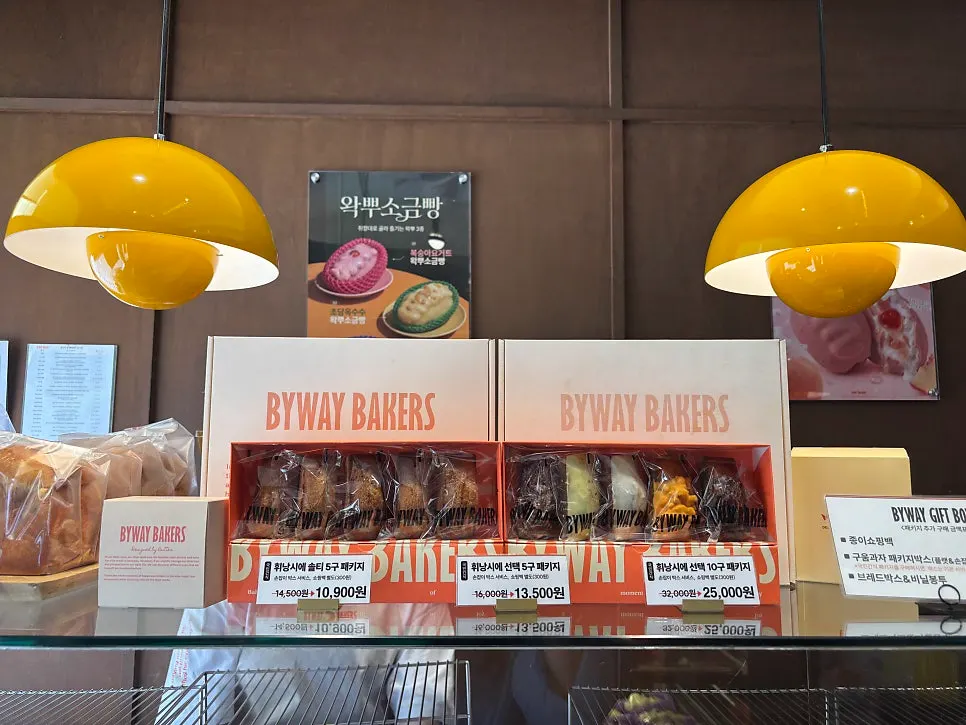 Display shelf with various salt breads and financiers