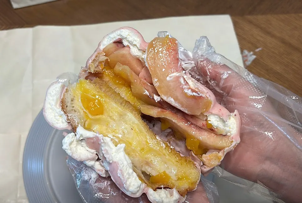Cross-section of the peach yogurt wakppu salt bread cut in half