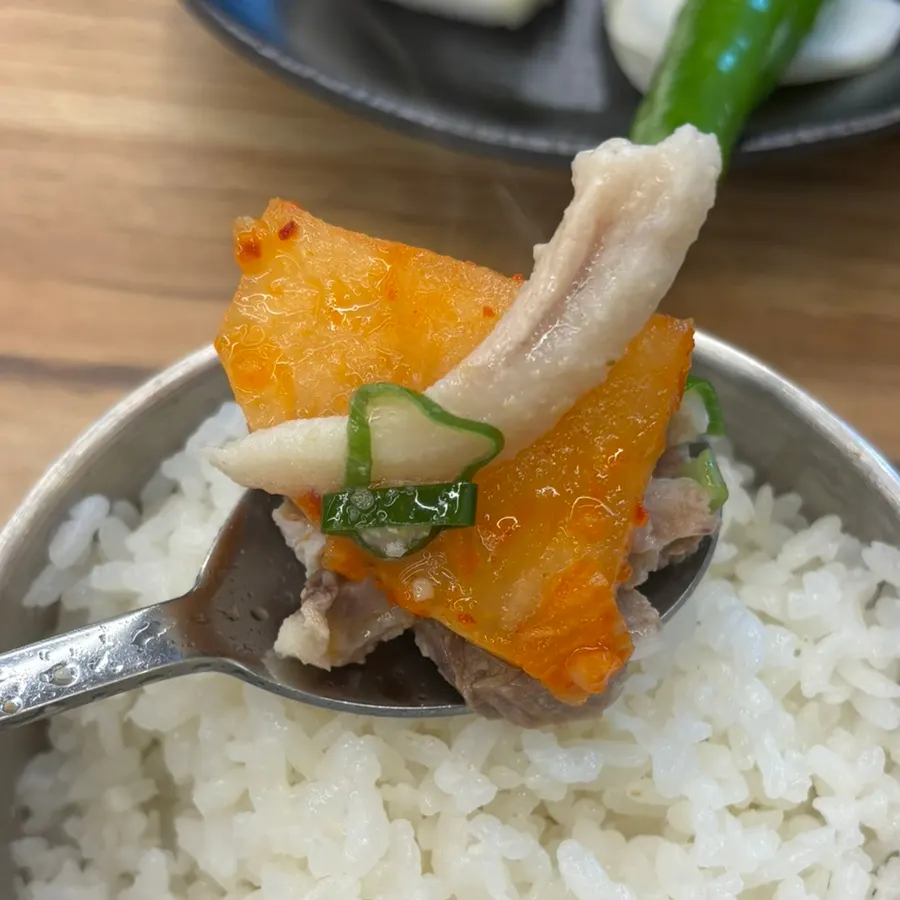 Pork gukbap served with side dishes