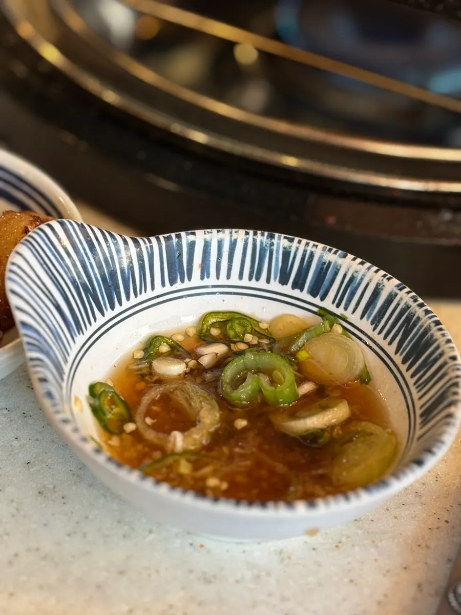 Sauces served alongside the pork belly