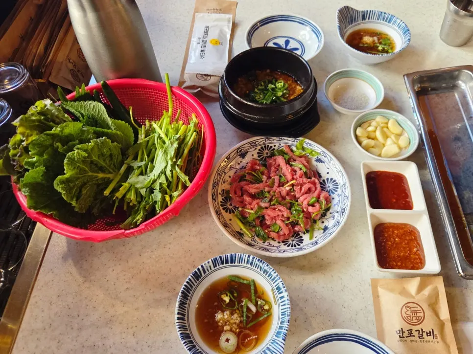 Table set with basic side dishes for pork belly