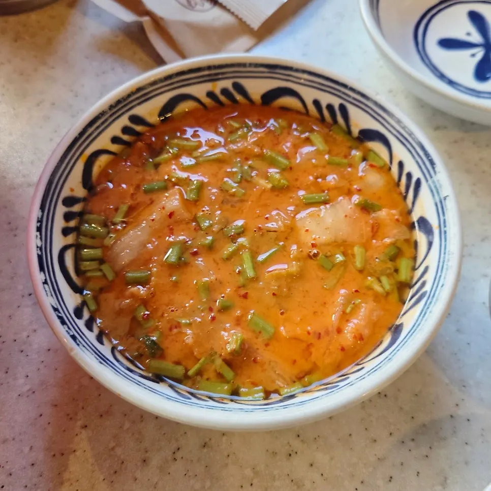 Bowl of minari kimchi pancake batter