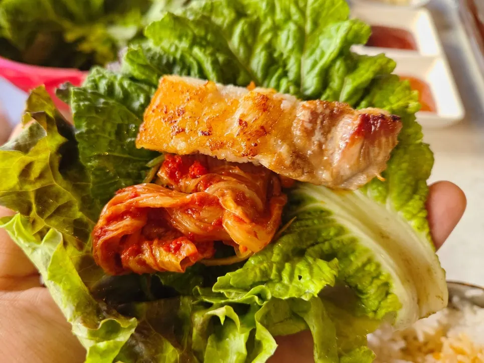 Pork belly dipped in salt and sesame oil sauce