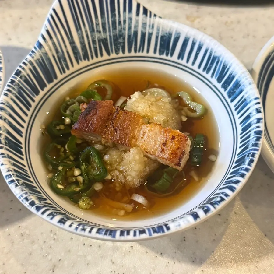 Stone-pot rice scooped into a bowl