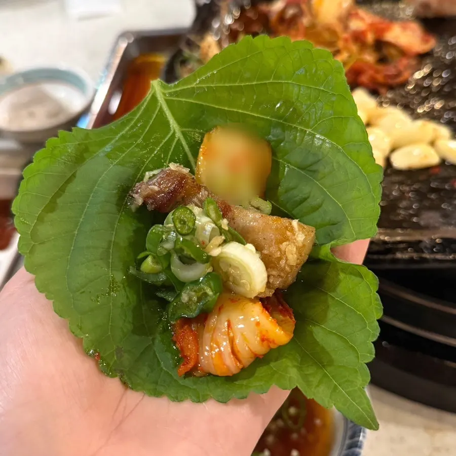 Pork belly dipped in sauce