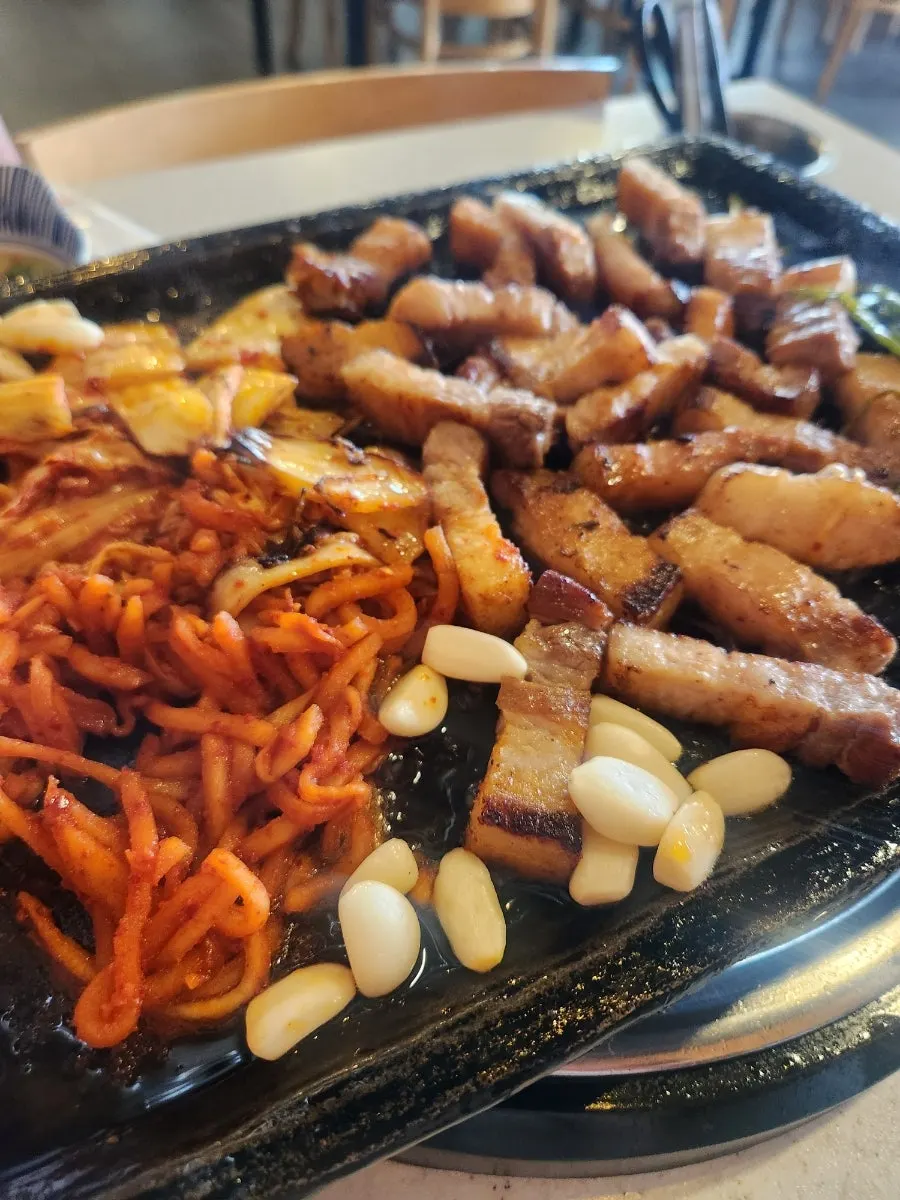 Fully grilled pork belly on the pan