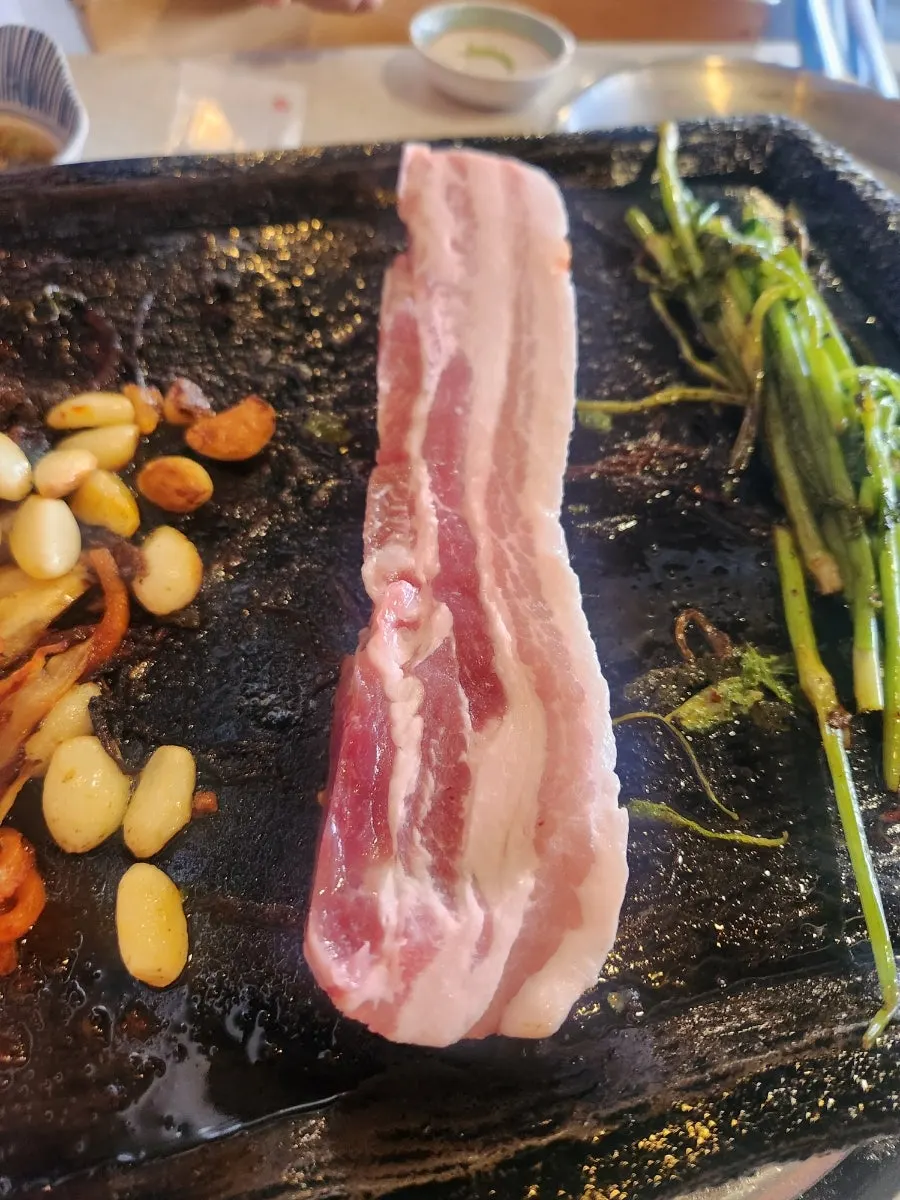 A chopstick-full of bibim noodles