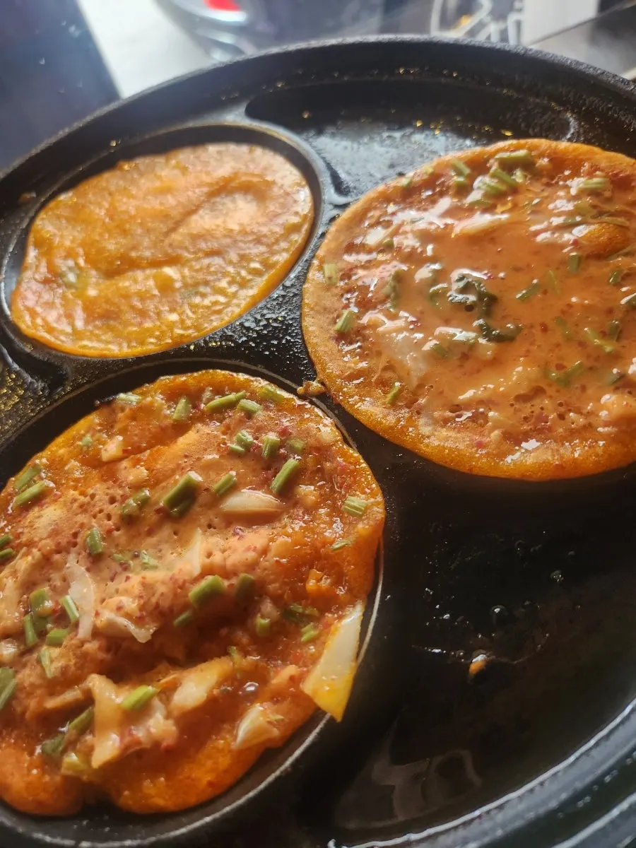 Side dishes with kimchi pancake and ssam vegetables