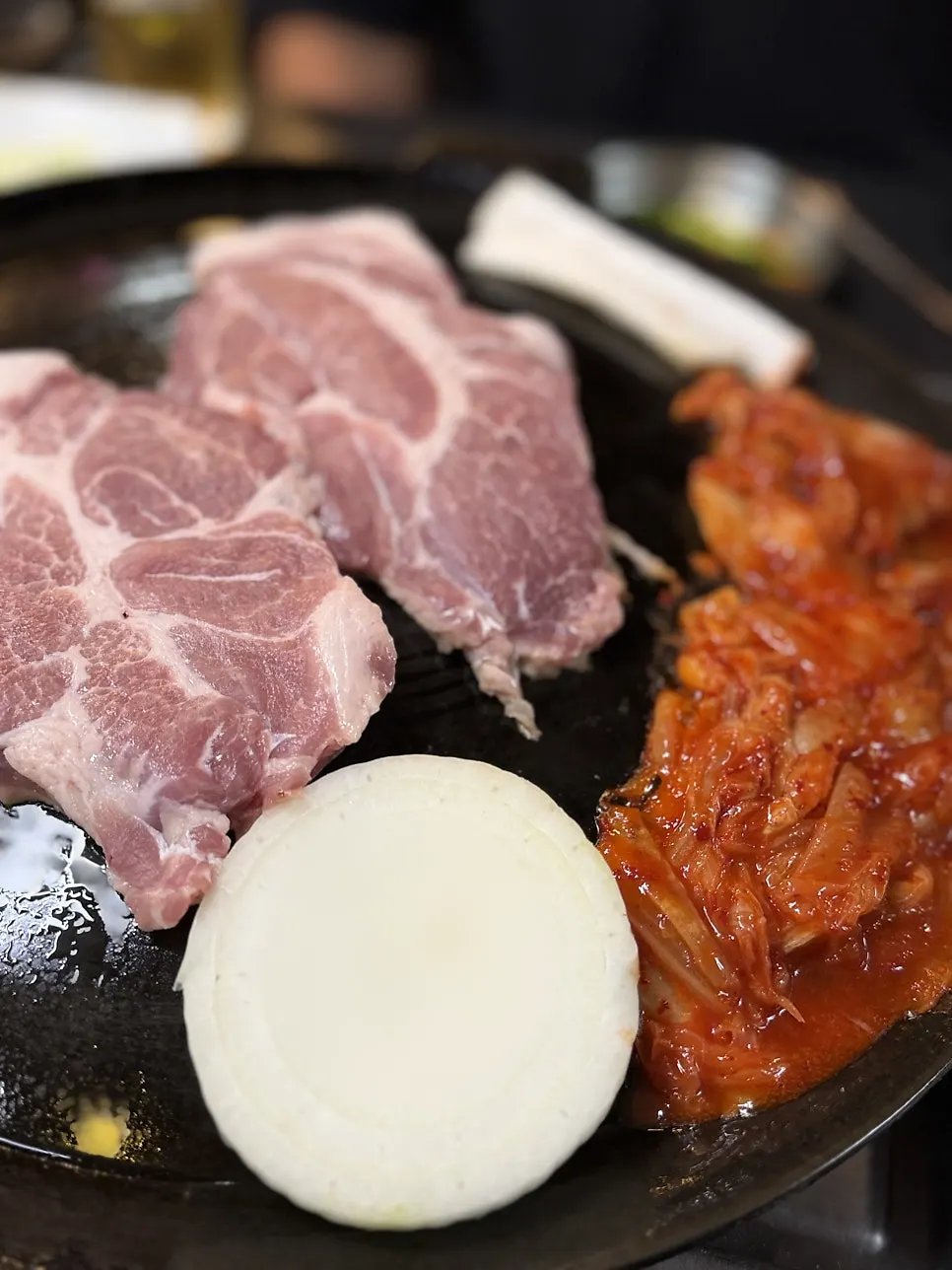Aged kimchi served alongside the meat