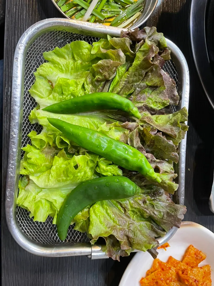 Lettuce wraps served alongside the meal