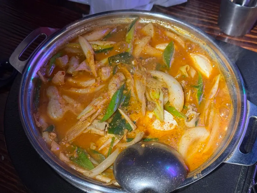 Gopchang hot pot bubbling on the stove