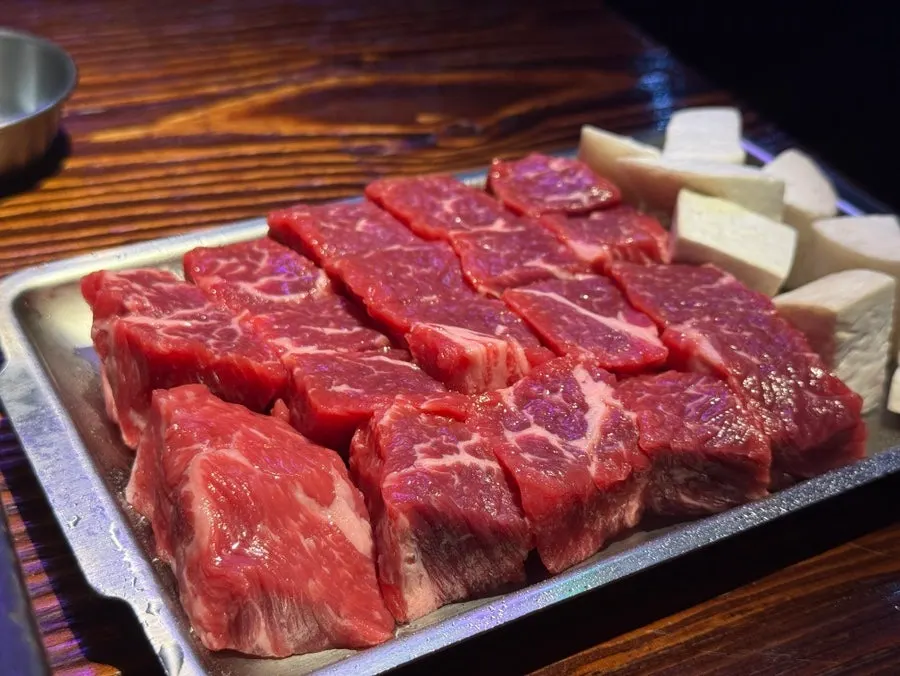 Table with meat and side dishes together