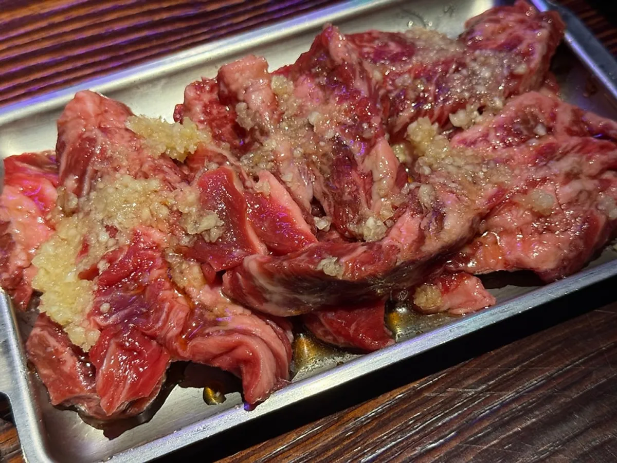 Beef dipped in sauce and salt