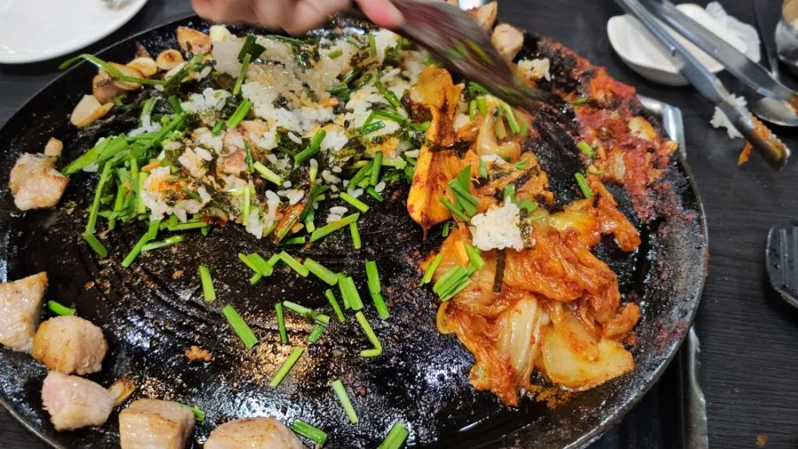 Fried rice served alongside the complimentary doenjang jjigae