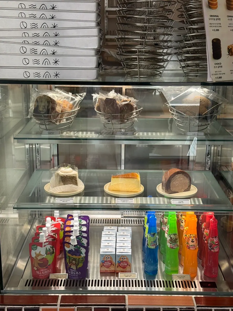 Display case with pound cakes and slice cakes