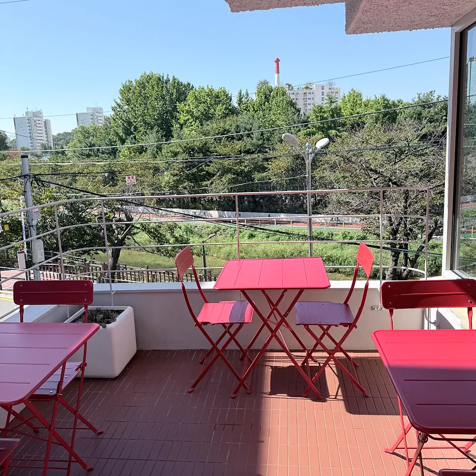 Terrace seating at Uisagye overlooking Uicheon Stream