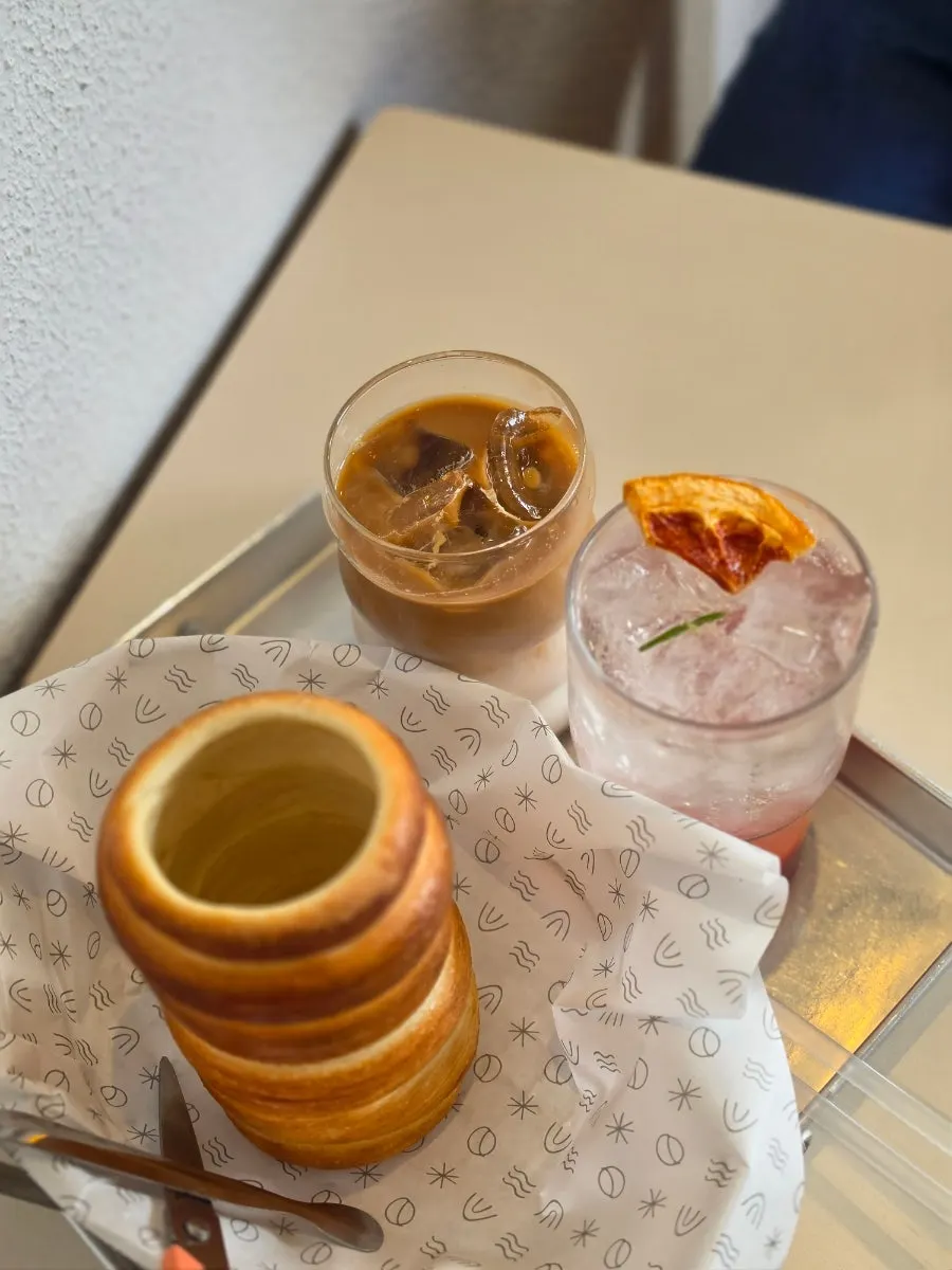 Chimney bread placed alongside coffee