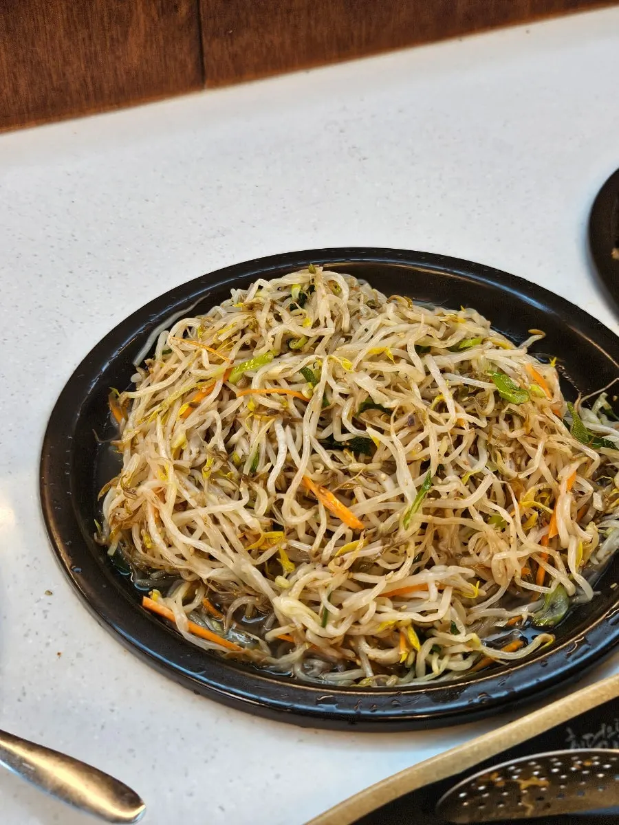 Japchae and mung bean sprout salad at the self-serve bar