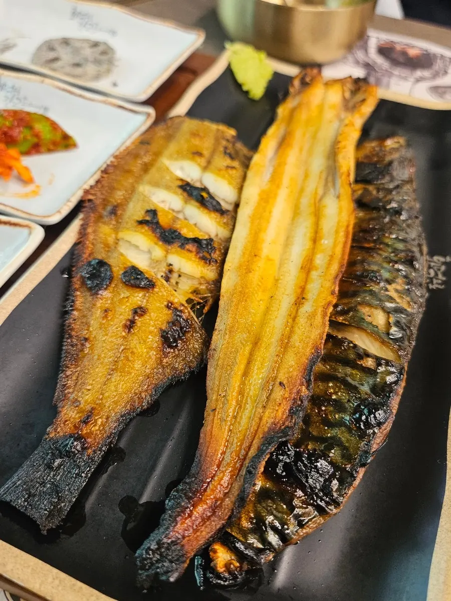 Plate of wood-fired grilled fish