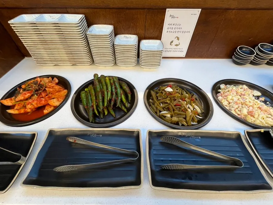 Radish kimchi, seasoned chili, and macaroni salad