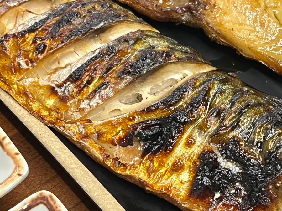 Golden-brown grilled mackerel