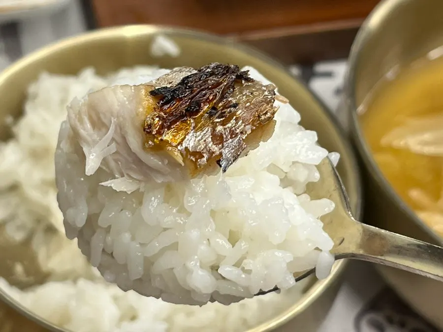 Grilled fish dipped in wasabi soy sauce