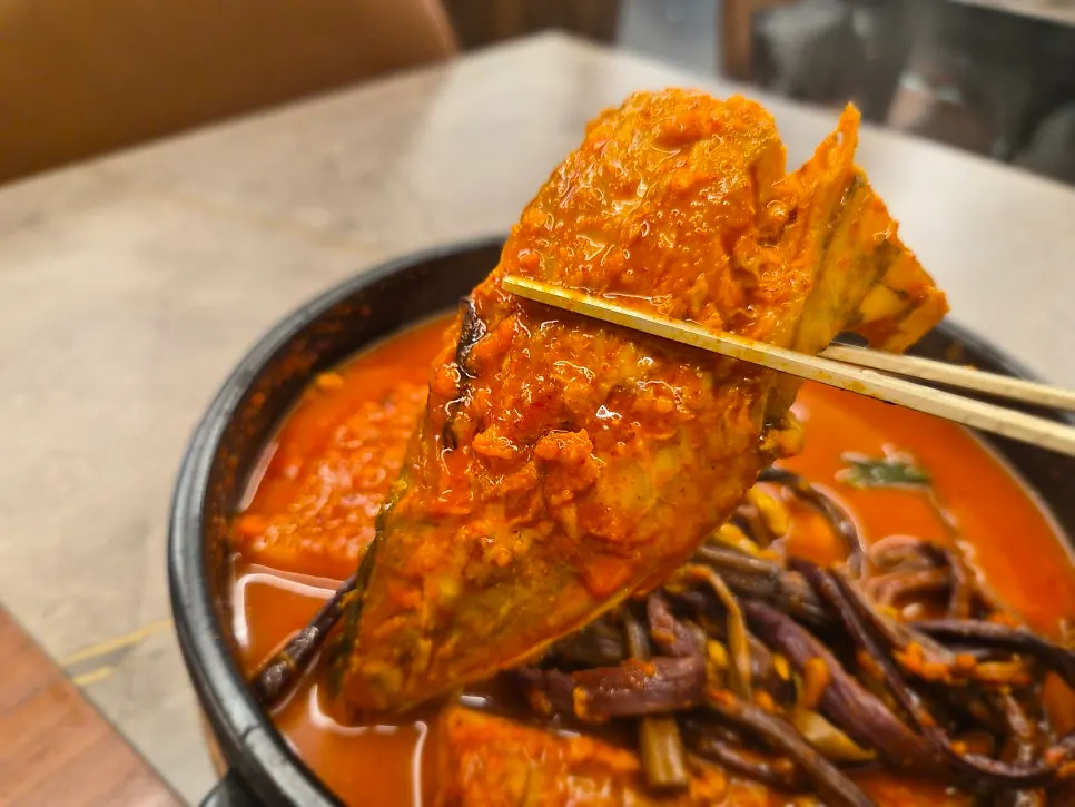 Dried radish greens inside the braised mackerel